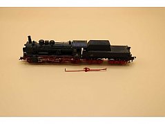 Modelleisenbahn und gelöstes Anbauteil