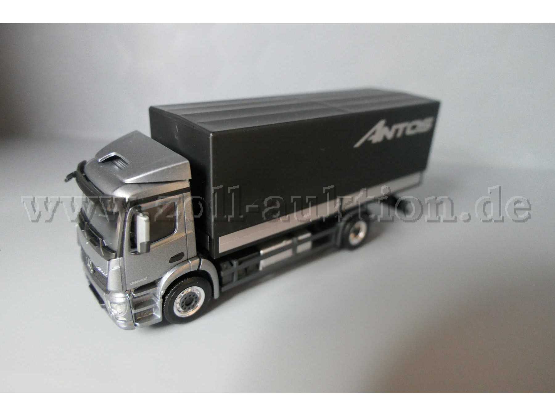 Herpa MB Antos 2542 schwarz-silber Ansicht von der linken Seite