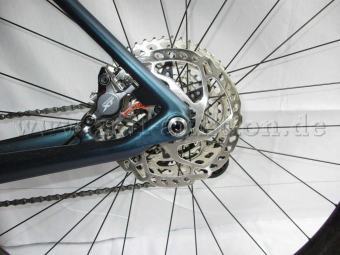 Ansicht Bremsscheibe und Shimano Deore XT Bremsblock am Hinterrad