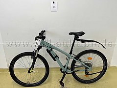 Mountainbike von Rockrider, links
