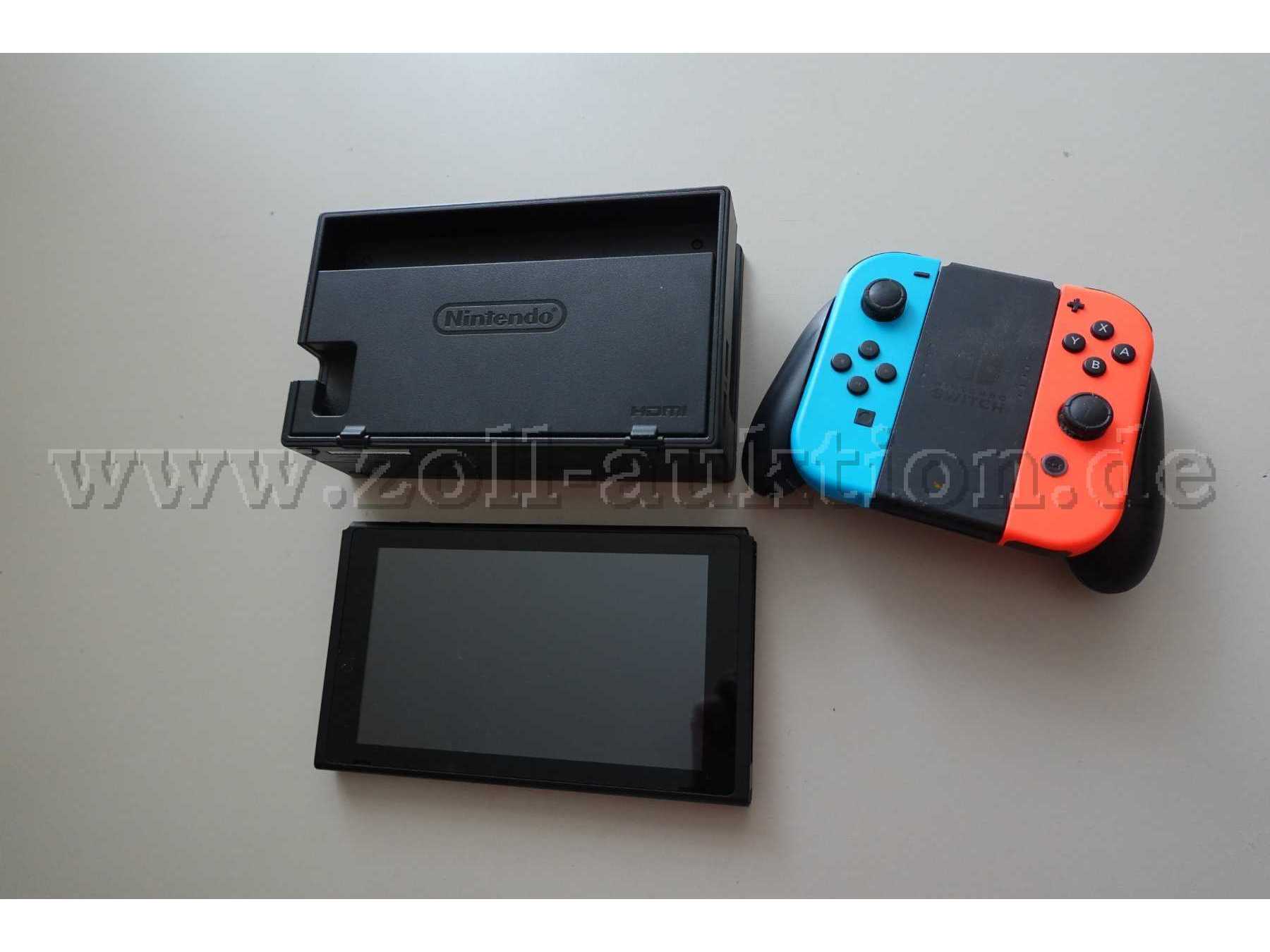 1 Nintendo Switch Konsole 32GB mit 2 Joy-Con Controllern, 1x in Neon-Rot und 1x in Neon-Blau incl. einer Dockingstation und einer Joy-Con-Halterung, gebraucht