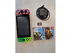 Nintendo Switch mit Netzwerkkabel und 2 Spiel