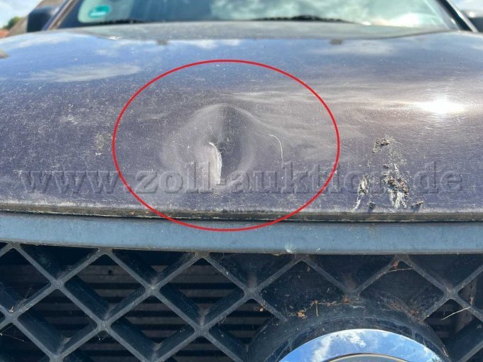 Motorhaube Beschädigung