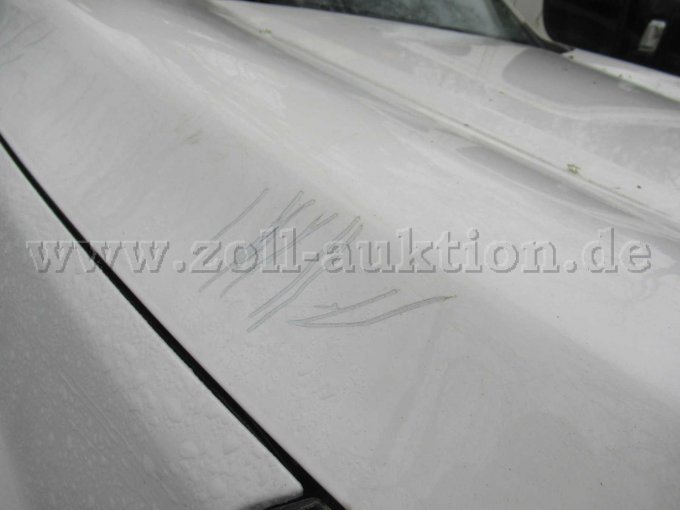 Motorhaube verschrammt