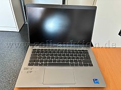 Gesamtansicht aufgeklappt mit Kratzer neben dem Touchpad