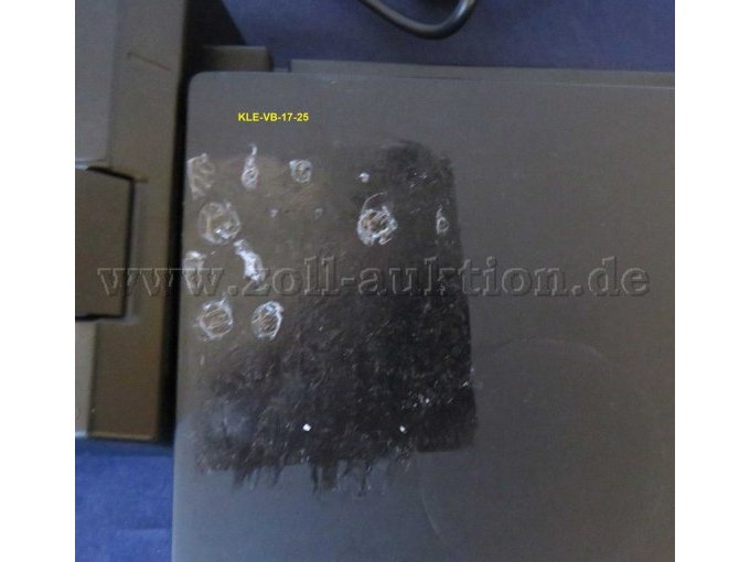 Notebook Klebereste auf Deckel (Musterbild)
