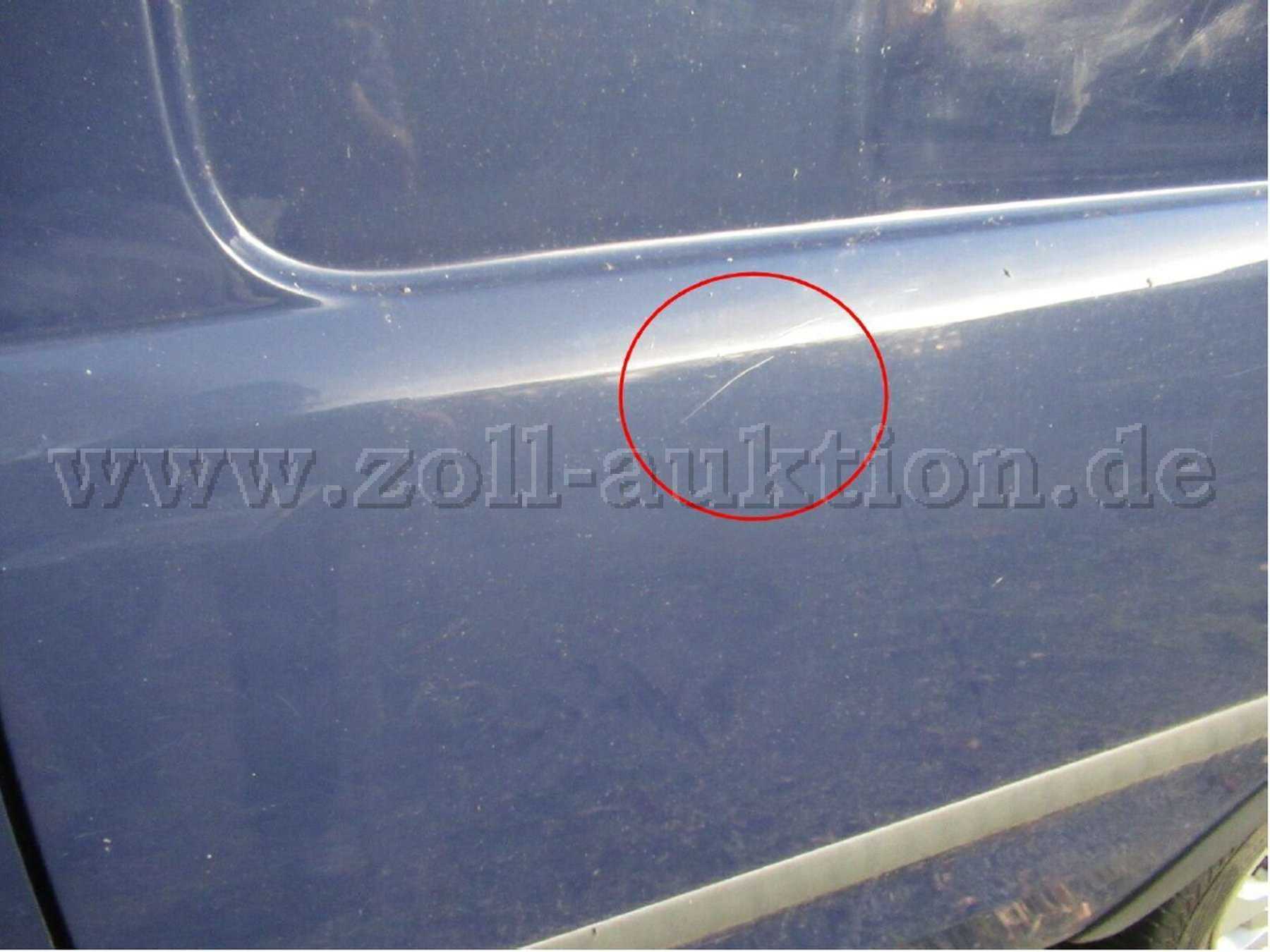 Seitenteil hinten links verkratzt