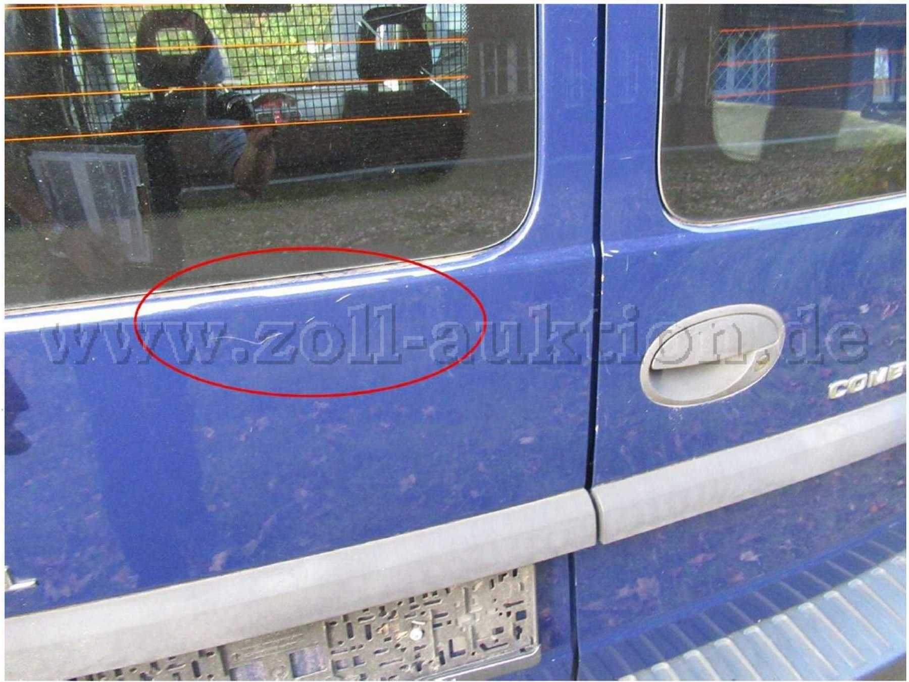 Heckflügeltür links verkratzt