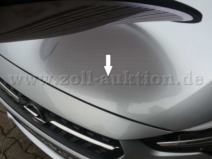 Beschädigung Motorhaube