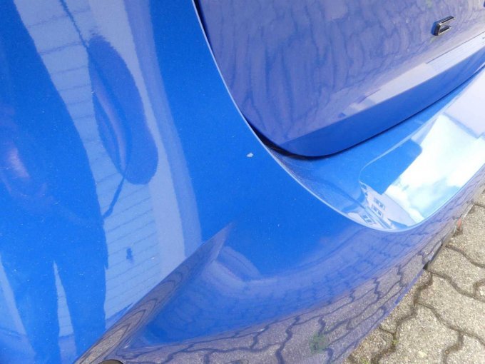 Beschädigung Stoßfänger hinten links