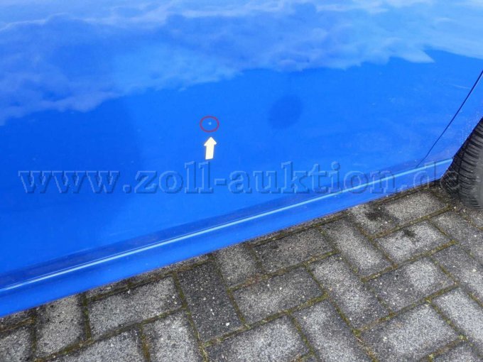 Tür vorne rechts Delle mit Lackbeschädigung