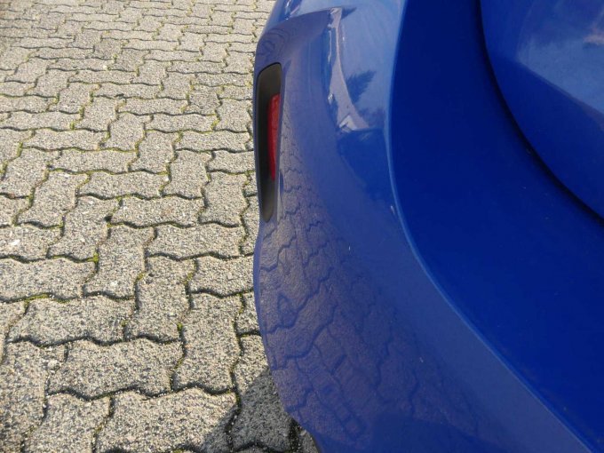 Kratzer Stoßfänger hinten links