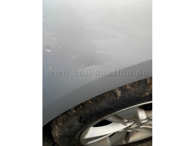 kleine Delle/Kratzer Kotflügel hinten links