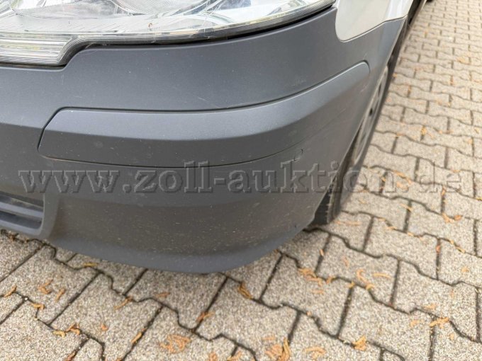 Stoßdämpfer verschrammt und deformiert