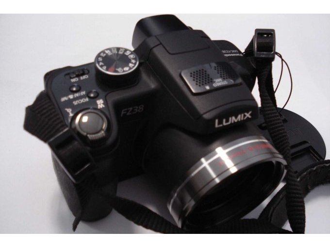 Der Einstell- u. Auslöseknopf für das Foto.