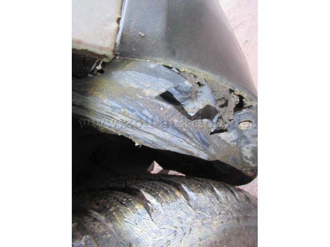 Radhausschale hinten gebrochen