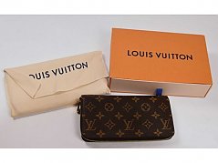 1 Portemonnaie „Louis Vuitton“ Zippy  mit Box und Staubbeutel