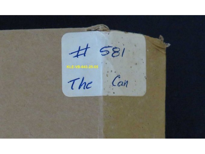 Aufkleber mit handschriftlicher Notiz