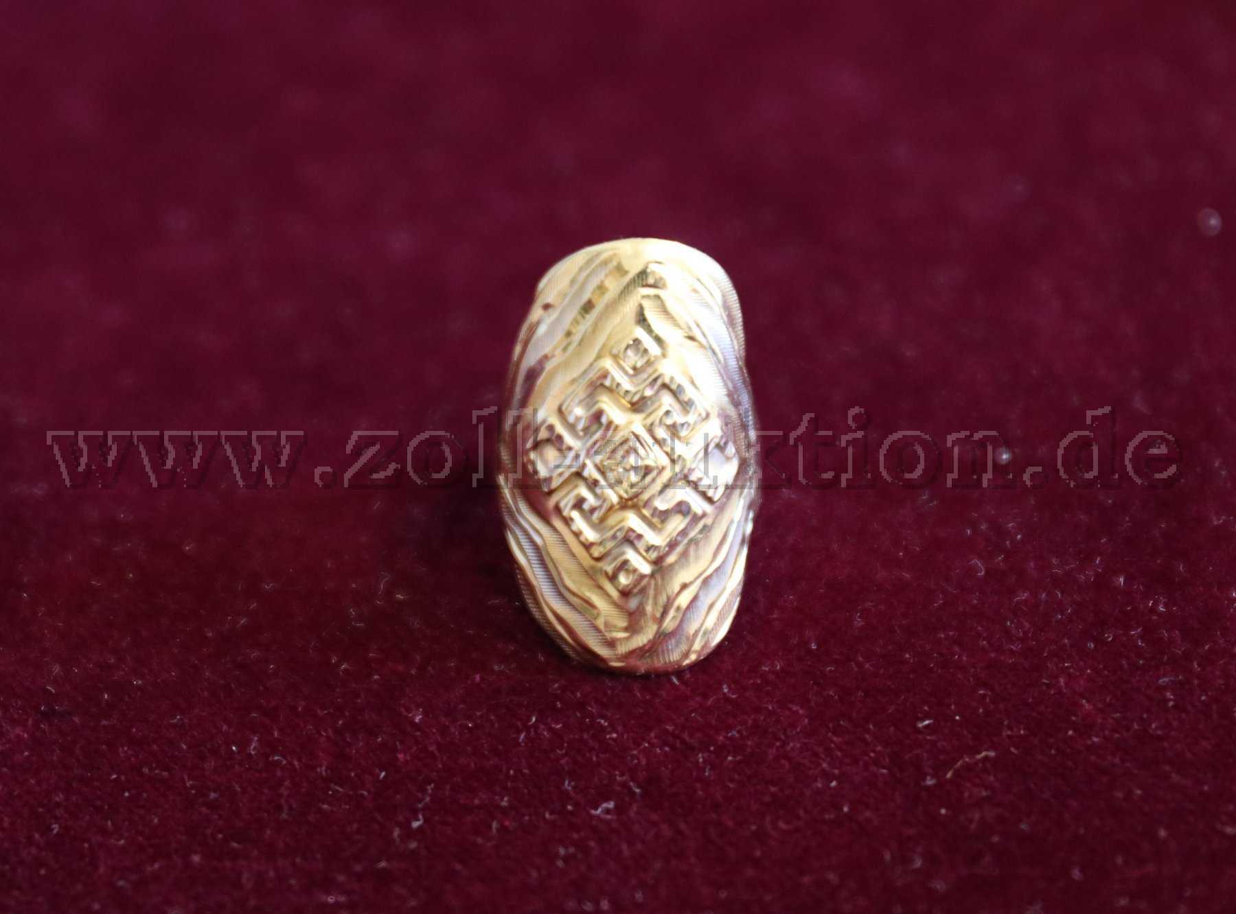1 two-tone ring made of 585 gold