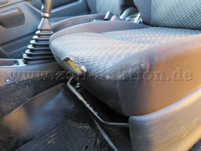 Beschädigung Fahrersitz