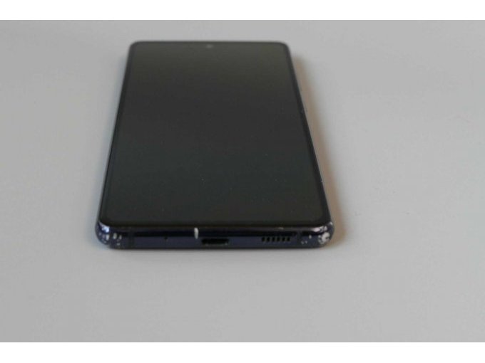 Samsung Galaxy S20 FE Dual SIM (SM-G780G), 128 GB, Ansicht der unteren Umrandung mit Displayansicht, Ladebuchse und Lautsprecherausgang sichtbar im Liegen