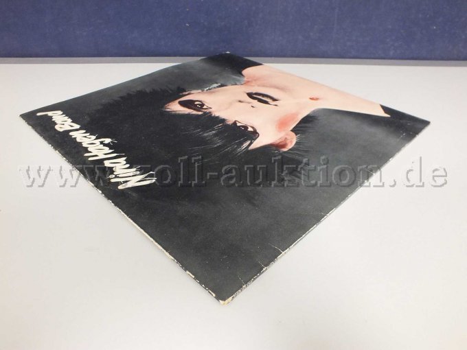 Seitliche Ansicht der LP liegend von links, mit Beschädigungen