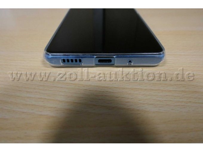 Detailaufnahme Lautsprecher, Ladebuchse und Sim-Slot