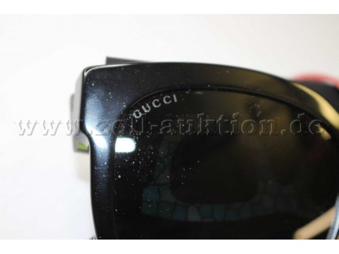 Sonnenbrille Gucci - Aufschrift Glas