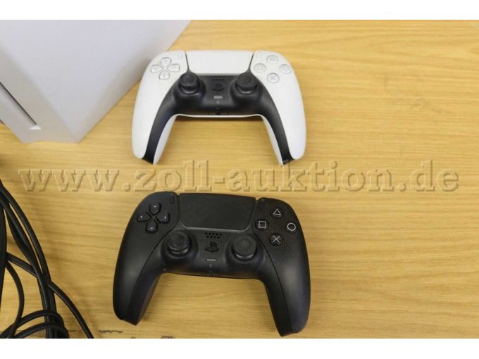 1 Controller weiß
1 Controller schwarz