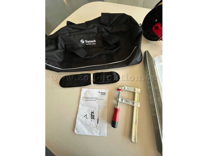 Tasche + Bedienungsanleitung + Schraubzwinge