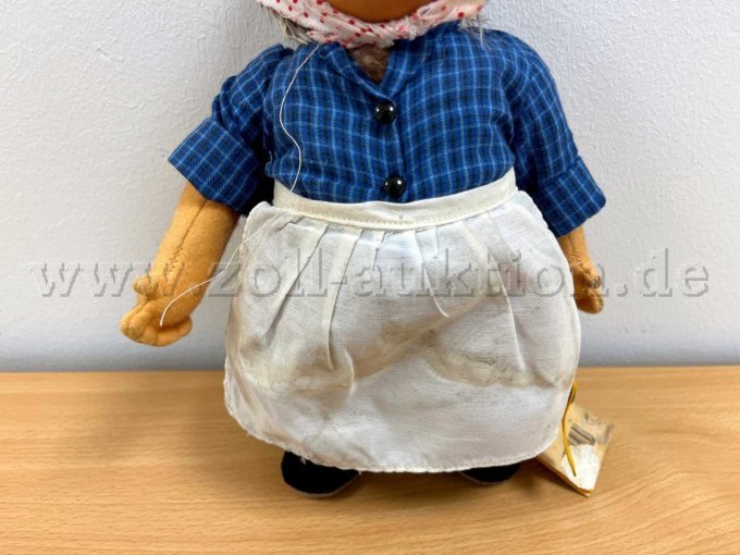 Stoff-Figur von Steiff "Micki", mit Knopf und Etikett, unterer Bereich (Hemd, Arme, Schürze)