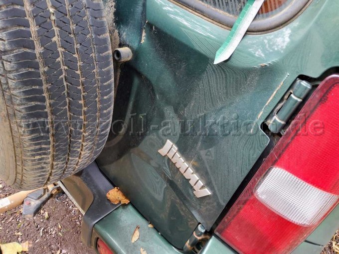 Heckklappe deformiert und zerkratzt, Korrosion