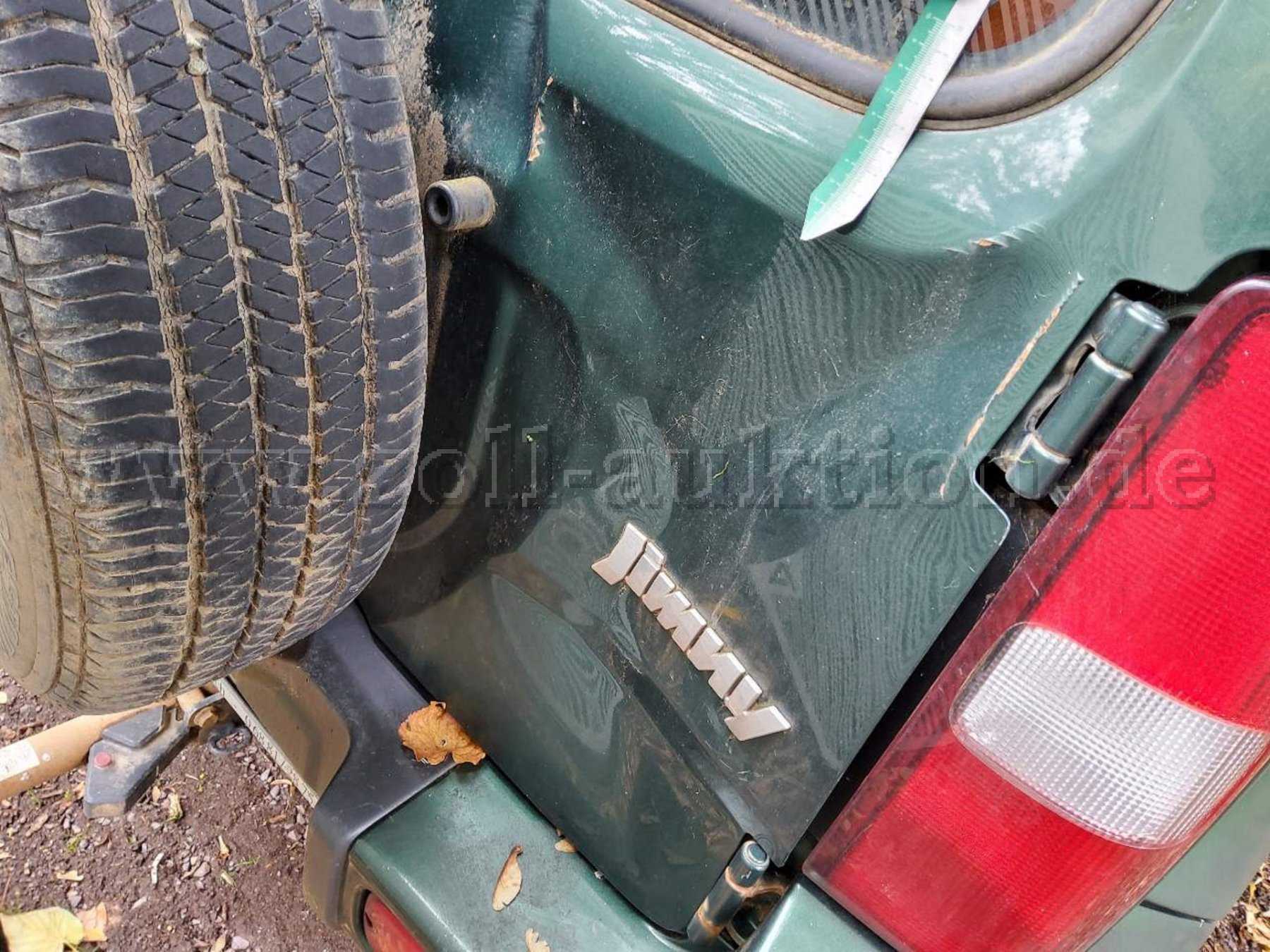 Heckklappe deformiert und zerkratzt, Korrosion