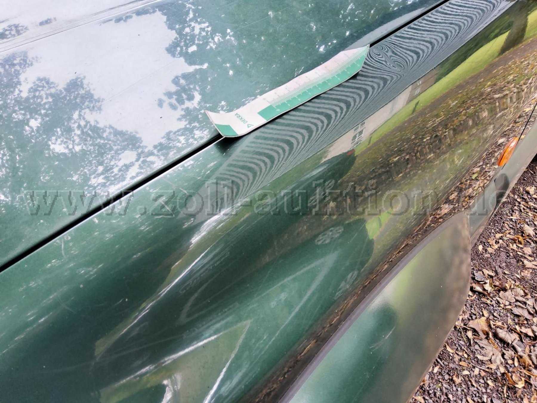 Dellen und Kratzer Kotflügel vorne links