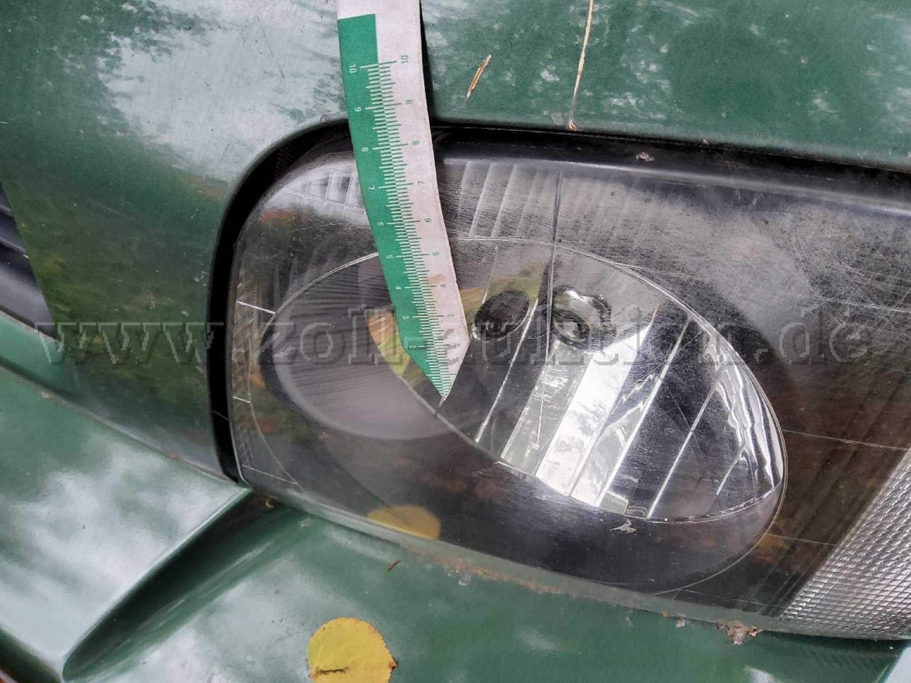 Kratzer Scheinwerfer link