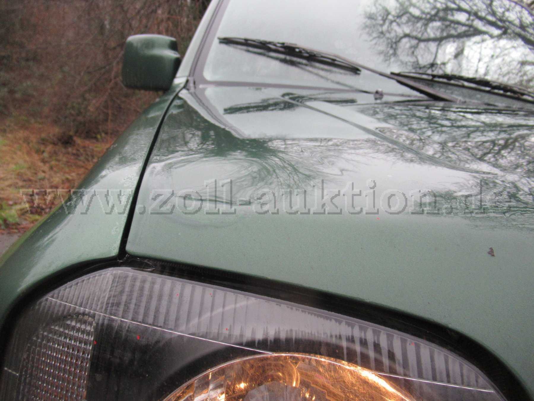 Beschädigung Motorhaube