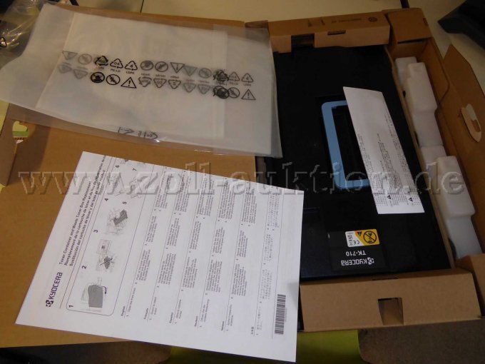 Ansicht Toner in geöffneter Verpackung seitlich von links oben