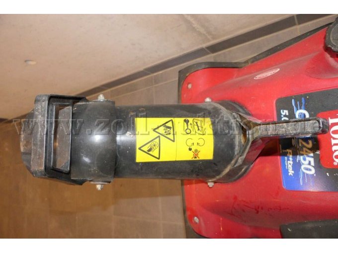 Detailaufnahme Warnhinweise Auswurfkanal