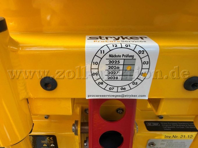 Prüfsiegel der letzten Wartung der Trage