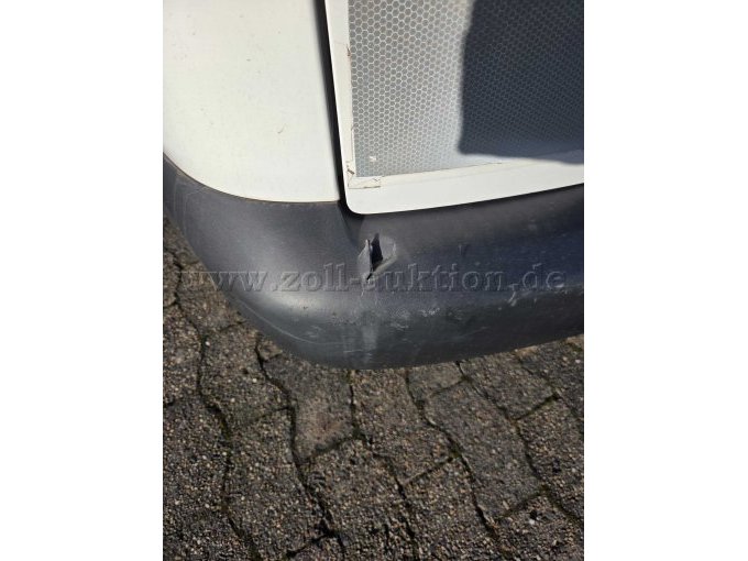 Beschädigung Stoßstange hinten links