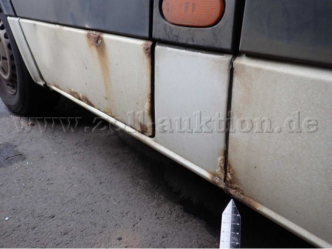 Seitenteil hinten links korrodiert