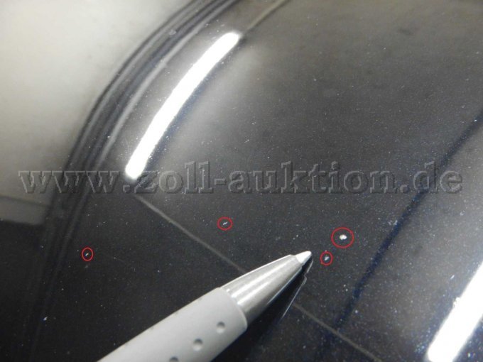 Motorhaube: Leichte Kratzer u. kleinere Steinschläge