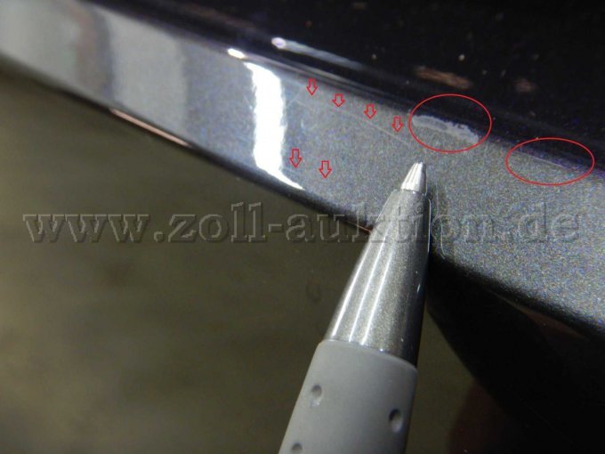 Stoßfänger hinten > Ladekante: Abschürfungen u. Kratzer, auch mit Lackbeschädigung