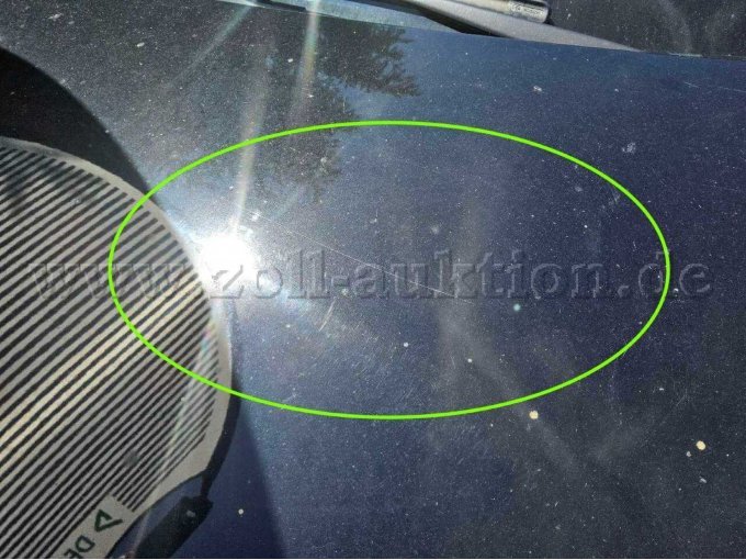 Motorhaube verschrammt