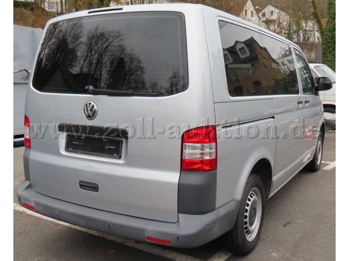 Ansicht diagonal hinten rechts, Heckklappe eingedellt, Bremsleuchte mittig fehlt