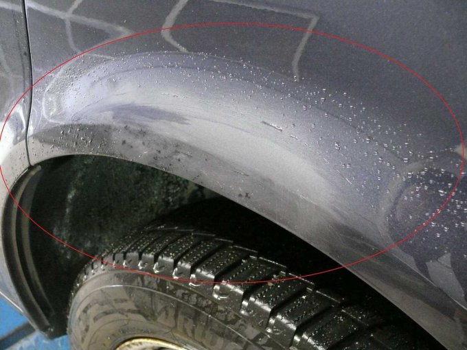 Beispielschaden Lackbeschädigung Kotflügel vorne rechts