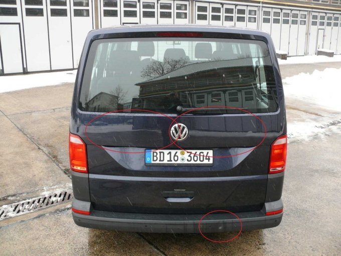 Beispielschaden Delle Lackbeschädigungen Heckklappe Stoßfänger und Ladekante hinten