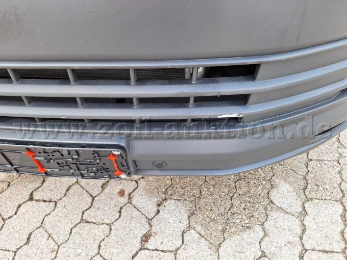 Kratzer im Kühlergrill