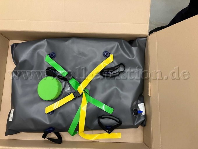 Vakuummatratze in Transportkarton  verpackt mit Gurten
