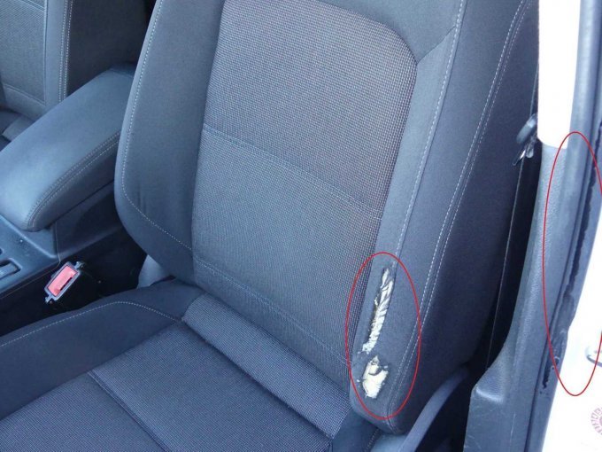 Beschädigung Fahrersitz